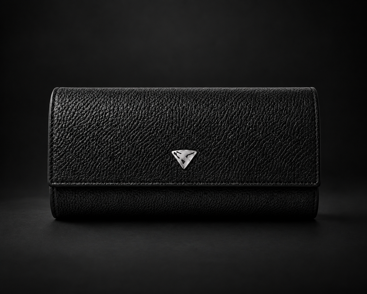 Superwatchman black leather three-watch roll on a dark studio background