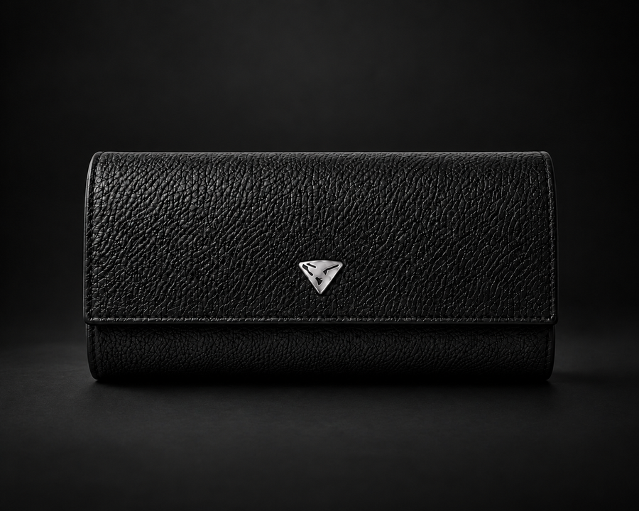 Superwatchman black leather three-watch roll on a dark studio background