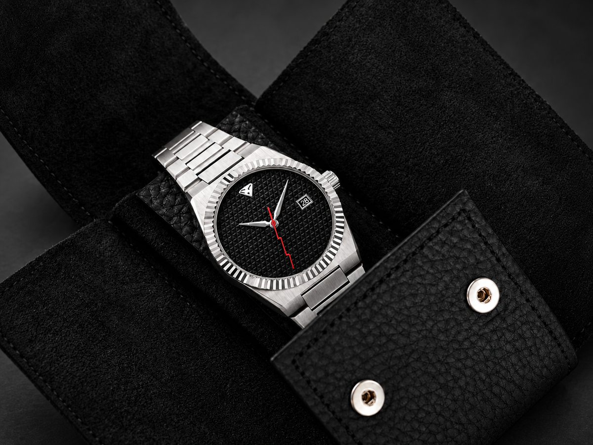 Open leather watch pouch protecting a watch